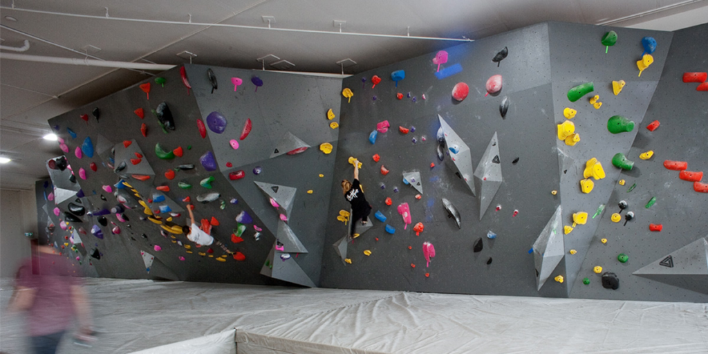A climbing gym. There are 3 different grades of wall, starting with a 45 degree overhang, than a 15, than a 10 degree slope.